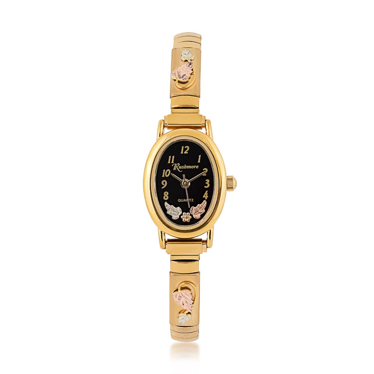 gold-tone stainless steel watch with black oval dial and pink and green gold leaf accents